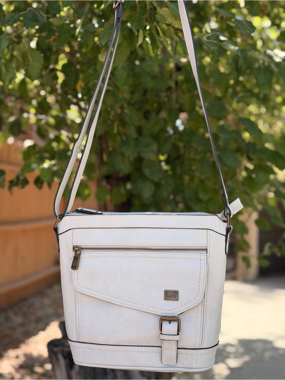 Women’s White Crossbody Bag with Front Zip and Buckle Detail